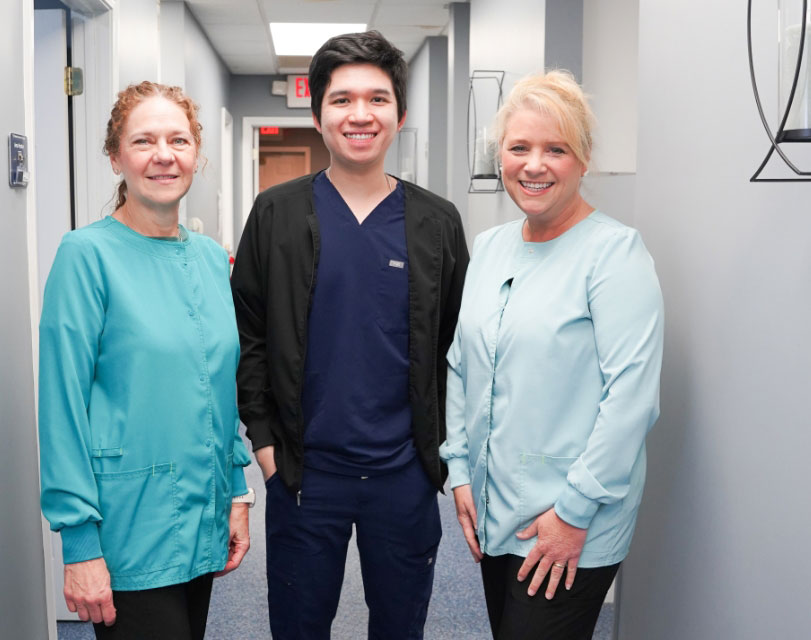 Conyers, GA dentist Dr. Nguyen with his team